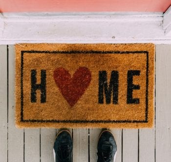 home doormat for how to live well alone blog post